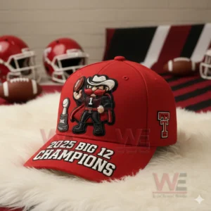 Angled view of a red football championship cap with mascot design placed on a soft surface in a sports setting!