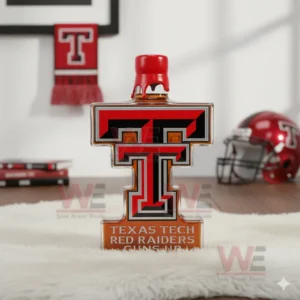 A Texas Tech letter bottle with a red top standing on a fluffy rug in a bright sports themed room!
