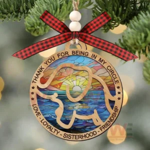 Wooden elephant outline ornament with sunrise ocean background and gratitude messages hanging on a tree!
