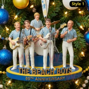 The image displays a Beach Boys ornament featuring band members performing with guitars and drums on a Christmas tree.