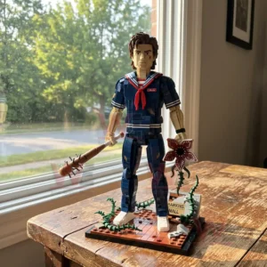 The Final Season Mom Steve Commemorative Edition Building Blocks 3 Building block character figure displayed on a table near a window with accessories and decorative base!