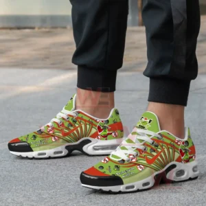 Sneakers shown on feet with vibrant green and red graphics arranged across the uppers in a dynamic playful style!