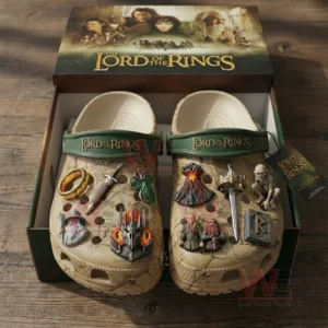 Beige Lord of the Rings themed clogs arranged in a display box with fantasy symbols charms and classic adventure styling!