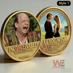 Two gold commemorative coins with emotional movie scenes displayed side by side on a smooth surface!
