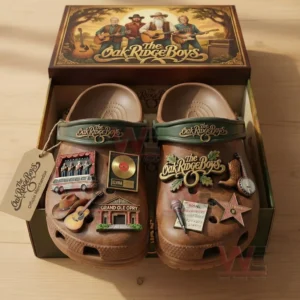 Brown Oak Ridge Boys themed clogs displayed in a decorative box with music charms guitars and band imagery!