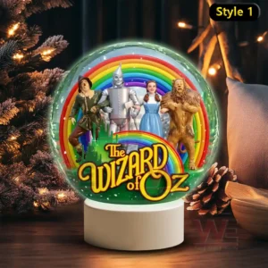 A snow globe with four fantasy characters standing before a rainbow and a bright title at the base!
