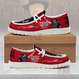 Side view product photo of Trace Adkins themed red slip on shoes on a brown box featuring tour logo performer image and signature graphic!