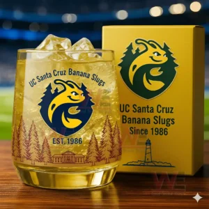 A yellow iced Banana Slugs glass beside a matching yellow box with a stadium backdrop!