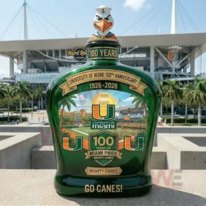 University of Miami anniversary bottle with bird topper shown in front of a stadium on a sunny day.