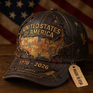 Vintage leather style baseball cap with stitched United States map and patriotic design shown against an American flag backdrop!