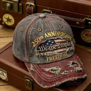 Distressed vintage baseball cap with embroidered 250th anniversary We the People Freedom design on leather luggage background!