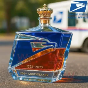 A USPS themed geometric anniversary bottle positioned outdoors with a postal vehicle in the background.