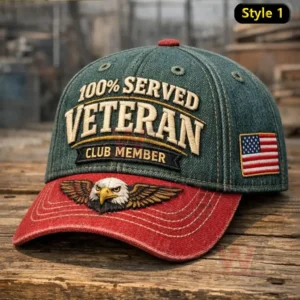 Two tone green and red cap with embroidered one hundred percent served veteran club member text eagle head graphic on the brim and a USA flag patch on the side!