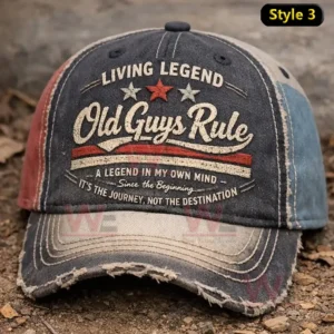 Distressed denim cap with Living Legend Old Guys Rule embroidery star accents multiple lines of inspirational text and a frayed worn brim.