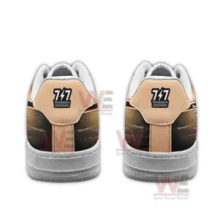 A rear view of sneakers displaying the Warren Zeiders lightning logo on tan heel panels.