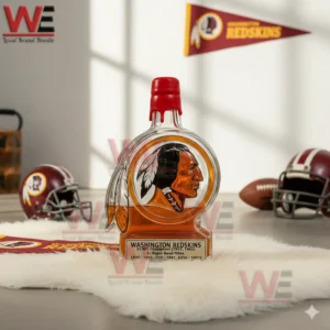 Washington Commanders NFL Champions Super Bowl Whiskey Decanter 6 Clear Washington themed bottle on white fur with football decor in a sunlit room!