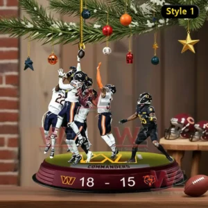 Football action ornament with players jumping for the ball hanging on a Christmas tree with festive decorations!
