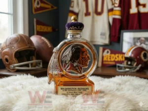 Washington Redskins themed whiskey bottle on white fur in a sports decorated room!