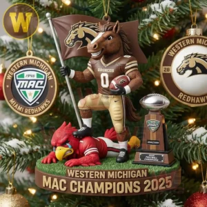 A Christmas tree ornament of the Western Michigan mascot holding a flag and football standing over a red bird figure with the MAC trophy nearby among holiday decorations!