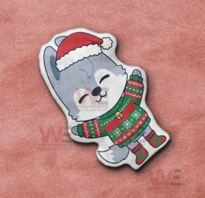 Wolf christmas pillow shown on a pink fabric background with a joyful expression!
