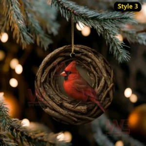 Red cardinal ornament sitting inside a woven wooden nest on a Christmas tree!