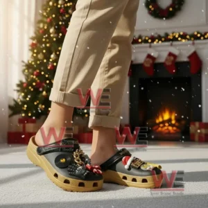 Wu Tang Clan Christmas Crocs Clogs with Charms 7 Person wearing Wu Tang Clan themed clogs with charms near a fireplace and Christmas decor!
