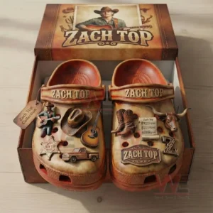 Western themed clogs presented in a collectible box with detailed country music and cowboy inspired charms!