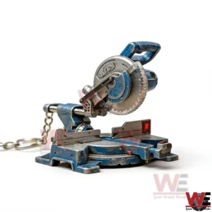 Gloved hand holding a miniature blue miter saw keychain above an open tool case!
