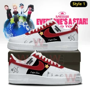 Two custom low top sneakers in white red and black with red swoosh black side panels star patch signature accents SOS text and Everyone s A Star themed background displayed on a shoebox!