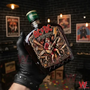 A leather gloved hand displays an ACDC whiskey bottle against a backdrop of classic rock posters and music gear!