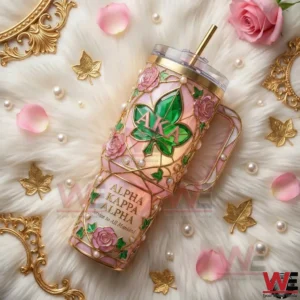 Pink and gold AKA floral tumbler with roses and green leaf emblem displayed on a soft decorative background!