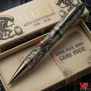 Aliens 40Th Anniversary Game Over Man Game Over Pen 5 Alien inspired engraved metal pen displayed on an open fortieth anniversary presentation box in a sci fi setting!