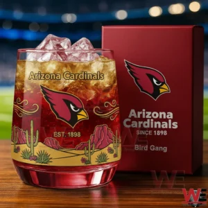 Arizona Cardinals whiskey glass with bird logo desert design and ice filled drink displayed next to a red team box!