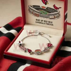 Open red gift box holding a silver adjustable charm bracelet with Arizona Cardinals charms and a lid illustration of a stadium with a fan slogan.