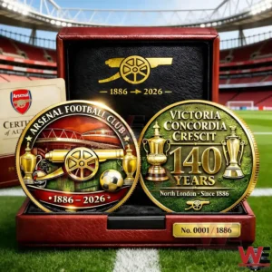 Arsenal 140th anniversary commemorative coin set in a red presentation box showing two gold detailed coins with Arsenal cannon emblem 1886 to 2026 and Victoria Concordia Crescit 140 years design on a stadium background