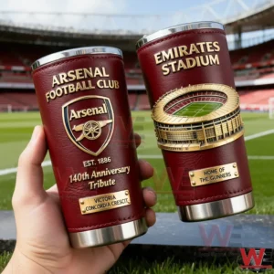 Arsenal Football Club Emirates Stadium Victoria Concordia Crescit Tumbler 3 Hands holding Arsenal insulated tumblers with red textured surface gold details founding year tribute and detailed Emirates Stadium relief inside the football stadium!