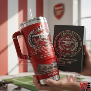 Arsenal The Gunners Era 1886-2026 140th Anniversary Tumbler Cup 3 Hands holding a red Arsenal themed insulated tumbler with handle and straw next to a collector series box in an indoor room with Arsenal decor behind!