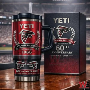 Atlanta Falcons 60Th Anniversary Limited Edition 1966-2026 Yeti Tumbler 5 Red Atlanta Falcons Yeti tumbler with handle and straw displayed beside a sixtyth anniversary box with a football stadium in the background!