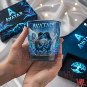 Hand holding an Avatar 17th anniversary glass with themed boxes in background!
