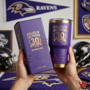 Purple Baltimore Ravens 30th anniversary tumbler without handle held next to a matching textured gift box with Bullies of Baltimore text and gold laurel wreath design