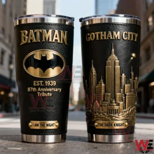 Two Batman inspired tumblers with black and gold design bat logo Gotham City skyline artwork and luxury finish placed on an urban street background!