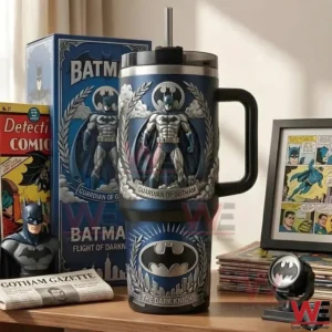 Batman themed tumbler standing on a table with comic books a display box and Gotham collectibles in a stylish fan environment!