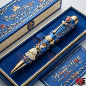 Beauty and the Beast themed anniversary pen inside a blue and gold presentation box with rose decorations