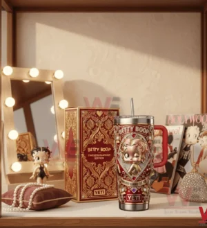 A Yeti tumbler and decorative box showcasing Betty Boop Timeless Glamour artwork placed on a vanity table with classic beauty items!