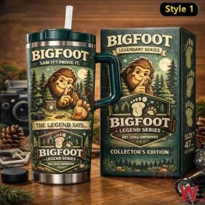 Bigfoot legendary series insulated tumbler with straw and handle next to a matching collectors edition gift box on a wooden table!