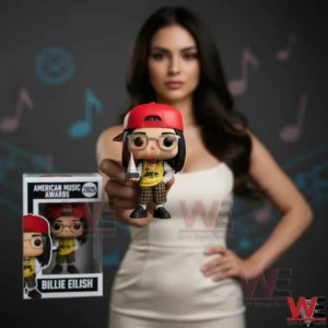 The image presents a music awards collectible figure held in front of a blurred studio background to emphasize the product design!