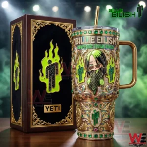 Decorative gold and green tumbler with stylized character design next to a premium box!