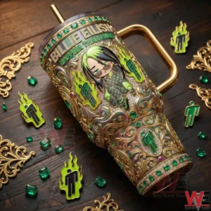 Ornate gold and green tumbler lying on a wooden table with decorative accents!