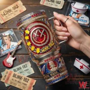 A person holding a Blink 182 tumbler with ornate patterns surrounded by music themed objects and concert tickets!