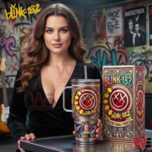 A woman displaying a Blink 182 tumbler and matching decorative box in a music themed studio environment!